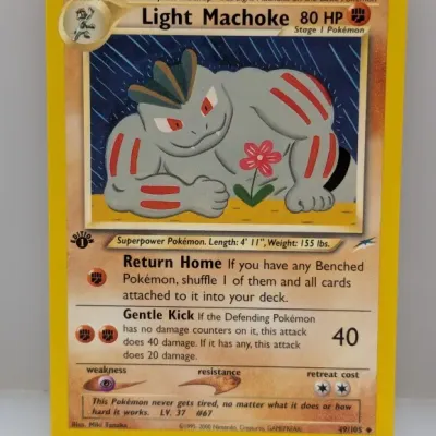 Sale Photo Thumbnail #613: 1st Edition Light Machoke Pokémon trading card (#49/105) from the Neo Destiny set, released in 2002.