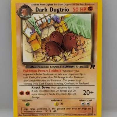 Sale Photo Thumbnail #843: Pokémon Dark Dugtrio trading card, number 23/82 from the 2000 Team Rocket expansion set.