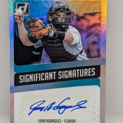 Sale Photo Thumbnail #252: Panini Donruss Significant Signatures Ivan Rodriguez autographed baseball trading card with holographic foil finish.