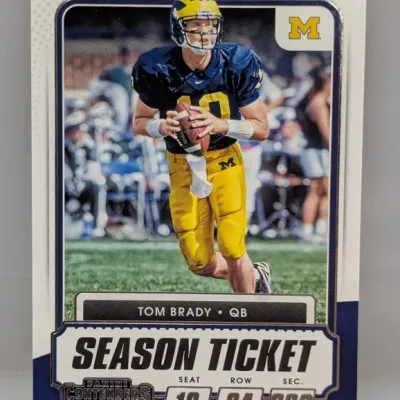 Sale Photo Thumbnail #934: 2020 Panini Contenders Draft Picks Tom Brady Season Ticket trading card featuring him in his University of Michigan football uniform.