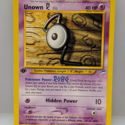 Sale Photo Thumbnail #657: 1st Edition Unown G #27/105 Pokémon trading card from the Neo Destiny expansion set, released in 2000.