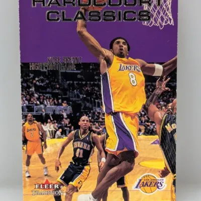 Sale Photo Thumbnail #417: Fleer Tradition Hardcourt Classics Kobe Bryant trading card featuring the Los Angeles Lakers guard mid-dunk.