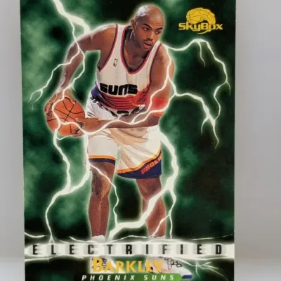 Sale Photo Thumbnail #561: 1990s SkyBox Premium 'Electrified' Charles Barkley Phoenix Suns trading card. The card features a lightning graphics background and appears to be in well-preserved condition.