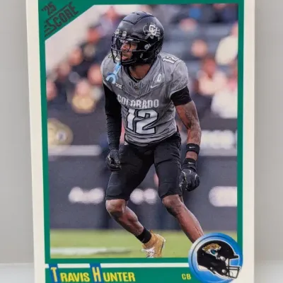 Sale Photo Thumbnail #689: 2025 Score Travis Hunter rookie trading card featuring him in his Colorado Buffaloes uniform, in near-mint condition.