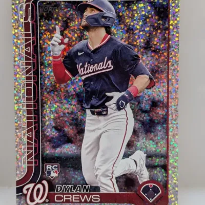 Sale Photo Thumbnail #634: 2024 Topps Dylan Crews Rookie Card featuring a glittery, holographic foil parallel background.