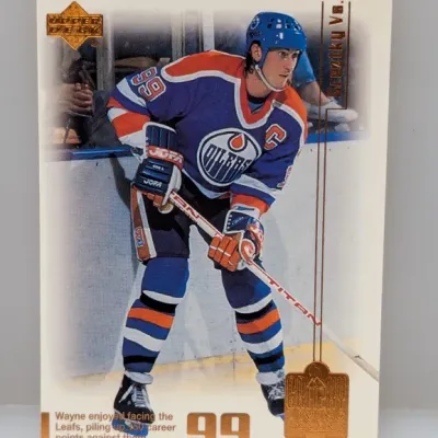 Sale Photo Thumbnail #757: Upper Deck Wayne Gretzky hockey trading card featuring Gretzky in an Edmonton Oilers jersey.