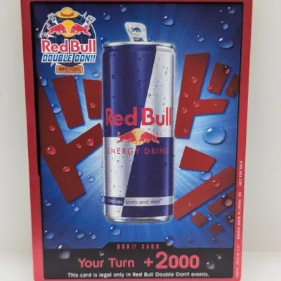 Sale Photo Thumbnail #132: One Piece Card Game Red Bull Double Don!! promotional card housed in a red display case.