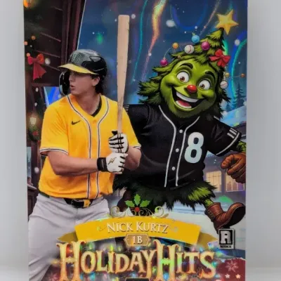 Sale Photo Thumbnail #490: Nick Kurtz Holiday Hits 1/4 limited edition baseball trading card, featuring holiday-themed artwork and foil finish.