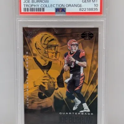 Sale Photo Thumbnail #127: PSA-graded Gem Mint 10 2020 Panini Illusions Joe Burrow Trophy Collection Orange rookie card #5.
