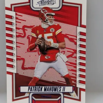 Sale Photo Thumbnail #921: Panini Absolute Football trading card featuring Kansas City Chiefs quarterback Patrick Mahomes II in near-mint condition.