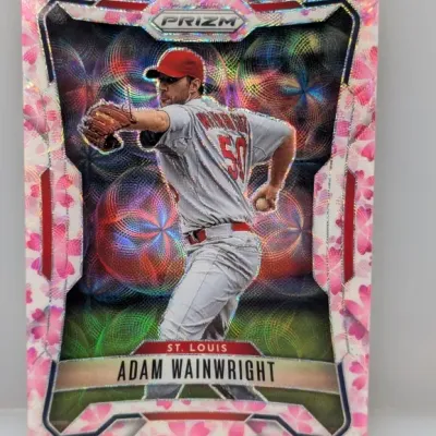 Sale Photo Thumbnail #93: Panini Prizm Adam Wainwright baseball trading card featuring a pink cherry blossom parallel border and holographic background pattern.