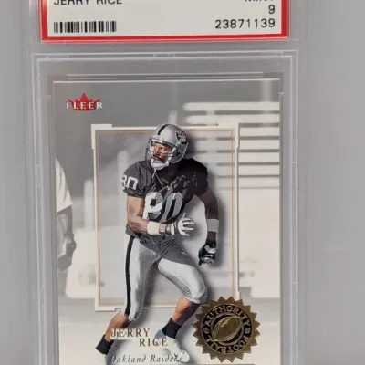 Sale Photo Thumbnail #166: PSA 9 Mint graded 2001 Fleer Authority #94 Jerry Rice trading card in a protective slab, depicting him with the Oakland Raiders.