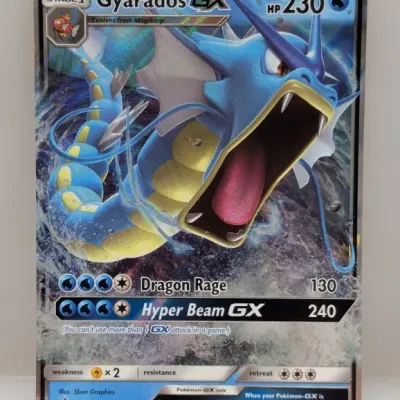 Sale Photo Thumbnail #701: Gyarados GX Pokémon trading card, SM212 promo edition from 2019, featuring full-art holographic illustration by 5ban Graphics.