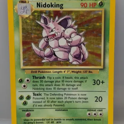 Sale Photo Thumbnail #106: Holographic Nidoking Pokémon card, Base Set #11/102, published by Wizards of the Coast in 1999.