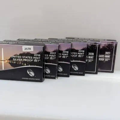 Sale Photo Thumbnail #1066: Collection of six United States Mint Silver Proof Sets in original packaging, dating from 2016 to 2021.
