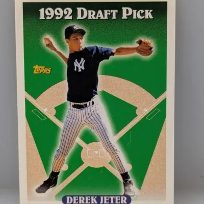 Sale Photo Thumbnail #497: 1993 Topps #98 Derek Jeter Draft Pick rookie baseball card in near-mint condition.