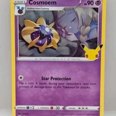 Sale Photo Thumbnail #761: Cosmoem Pokémon trading card from the 25th Anniversary Celebrations set (014/025), released in 2021. Features full-color artwork by kirisAki and the 25th anniversary Pikachu stamp.