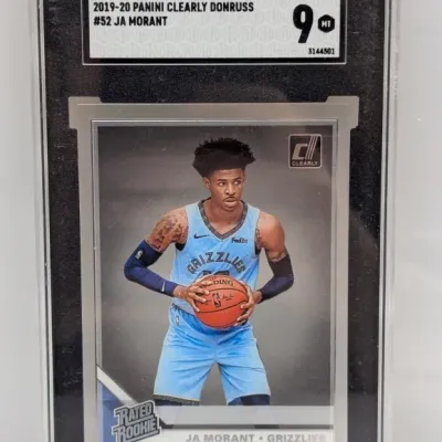 Sale Photo Thumbnail #102: SGC-graded 9 Mint 2019-20 Panini Clearly Donruss Ja Morant Rated Rookie card #52.