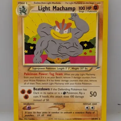 Sale Photo Thumbnail #846: Light Machamp #25/105 Pokémon trading card from the Neo Destiny set, released in 2002.