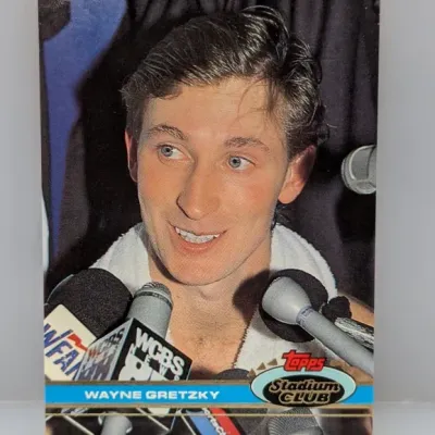 Sale Photo Thumbnail #343: 1991-92 Topps Stadium Club Wayne Gretzky hockey trading card #34, featuring a post-game interview photo.