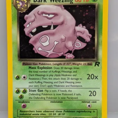 Sale Photo Thumbnail #66: Pokémon Team Rocket set Dark Weezing holographic trading card (14/82), released in 2000.