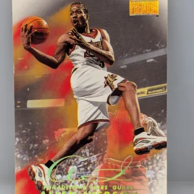 Sale Photo Thumbnail #477: 1997-98 Fleer Premium Allen Iverson basketball trading card featuring a gold foil name and logo stamp.