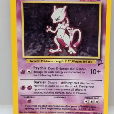 Sale Photo Thumbnail #330: Base Set 2 holographic Mewtwo Pokémon trading card (#10/130), copyright 1999-2000 Wizards of the Coast.