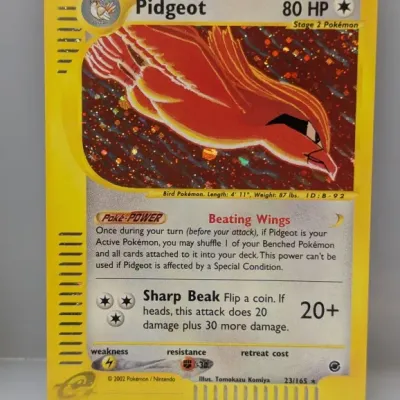 Sale Photo Thumbnail #120: 2002 Pokémon Expedition Base Set holographic Pidgeot trading card, #23/165, illustrated by Tomokazu Komiya.