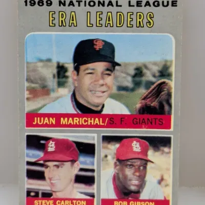 Sale Photo Thumbnail #674: 1970 Topps #67 1969 National League ERA Leaders baseball card featuring Juan Marichal, Steve Carlton, and Bob Gibson.