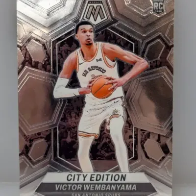 Sale Photo Thumbnail #321: 2023-24 Panini Mosaic Victor Wembanyama City Edition rookie card #267, featuring silver prizm finish.