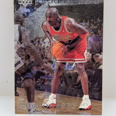 Sale Photo Thumbnail #533: Upper Deck Michael Jordan Tribute 'MJ Reflections' basketball card featuring him in his Chicago Bulls uniform.