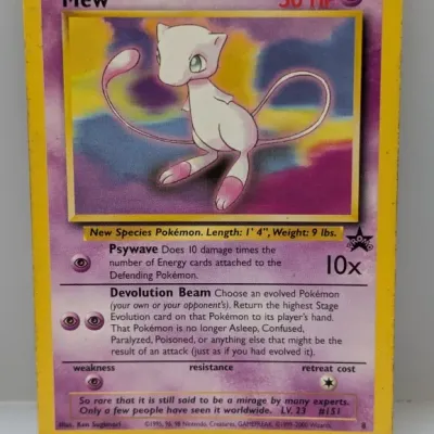 Sale Photo Thumbnail #441: Vintage Pokémon promotional Mew card #8 with artwork by Ken Sugimori, showing slight wear along the yellow borders.