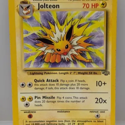 Sale Photo Thumbnail #456: Vintage 1999 Pokémon Jungle set Jolteon non-holo rare card (20/64), featuring artwork by Kagemaru Himeno with light wear along the edges.
