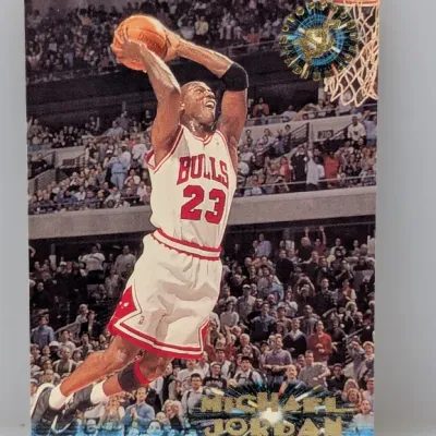 Sale Photo Thumbnail #399: 1993-94 Topps Stadium Club Michael Jordan #169 trading card featuring the gold foil logo and name stamping.