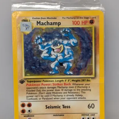 Sale Photo Thumbnail #58: 1999 Wizards of the Coast Pokémon Base Set 1st Edition holographic Machamp card (8/102), sealed in original plastic packaging.