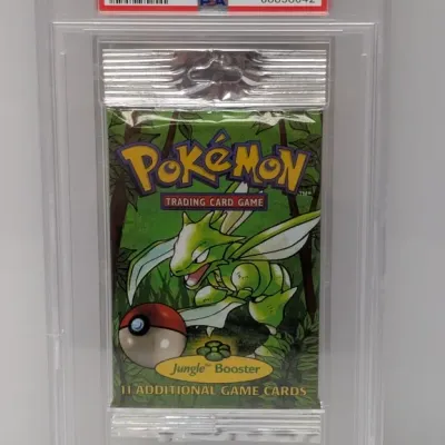 Sale Photo Thumbnail #10: PSA-graded 10 Gem Mint 1999 Pokémon WOTC Jungle booster foil pack featuring Scyther art.