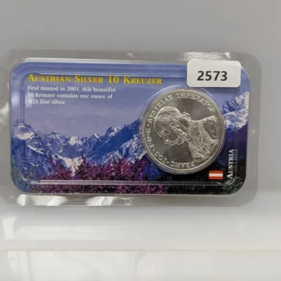 Sale Photo Thumbnail #1069: Austrian Silver 10 Kreuzer one ounce .925 fine silver coin sealed in original protective blister pack display.
