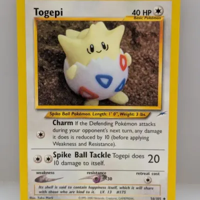 Sale Photo Thumbnail #554: Togepi Pokémon trading card, Neo Genesis set #56/105, featuring artwork by Yuka Morii, circa 2000.