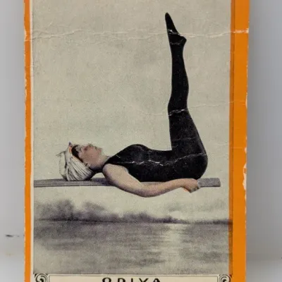 Sale Photo Thumbnail #421: Vintage Odiva cigarette trade card featuring an aquatic performer in a black swimsuit, showing light wear and creasing along the edges.