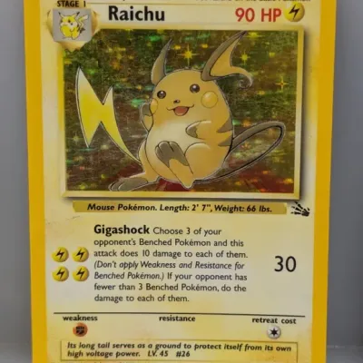 Sale Photo Thumbnail #282: 1999 Pokémon Fossil set Raichu holographic trading card (#14/62) featuring artwork by Mitsuhiro Arita.