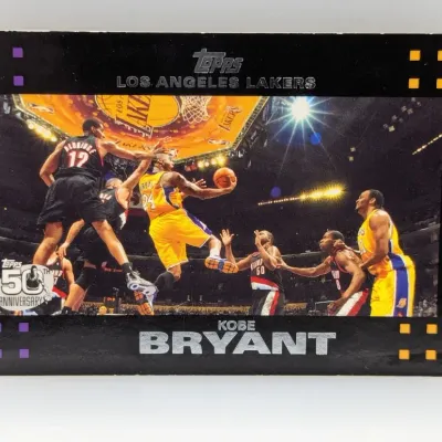 Sale Photo Thumbnail #434: 2007-08 Topps 50th Anniversary Kobe Bryant #24 basketball card featuring an in-game action shot against the Portland Trail Blazers.