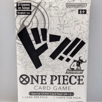 Sale Photo Thumbnail #841: Sealed One Piece Card Game 4th Anniversary Special DON!! Card Pack DP-12 by Bandai Namco in new, unopened condition.