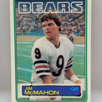 Sale Photo Thumbnail #591: 1983 Topps Jim McMahon rookie trading card (#33) featuring the Chicago Bears quarterback in good condition.