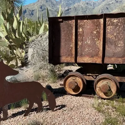 Antique Mining Ore Cart on Railroad Tracks & Coyote 