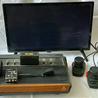 Atari 2600 Video Game Console with 19 Inch Insignia TV