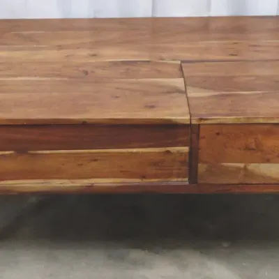 Mid-century modern style wooden coffee table with a pop-up or lift-top section, single drawer, and tapered round legs.