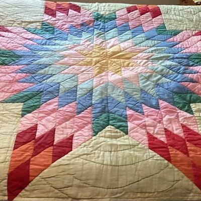 Sale Photo Thumbnail #399: Vintage quilt has some damage to the back side.
