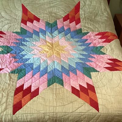 Sale Photo Thumbnail #397: Vintage quilt has some damage to the back side.