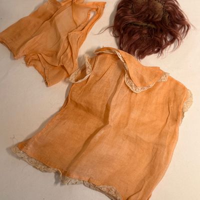 Sale Photo Thumbnail #396: Hair, extra clothes shown were original items when doll was bought. 
Eyes open when upright closed when laying down.
