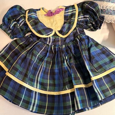 Sale Photo Thumbnail #394: Hair, extra clothes shown were original items when doll was bought. 
Eyes open when upright closed when laying down.